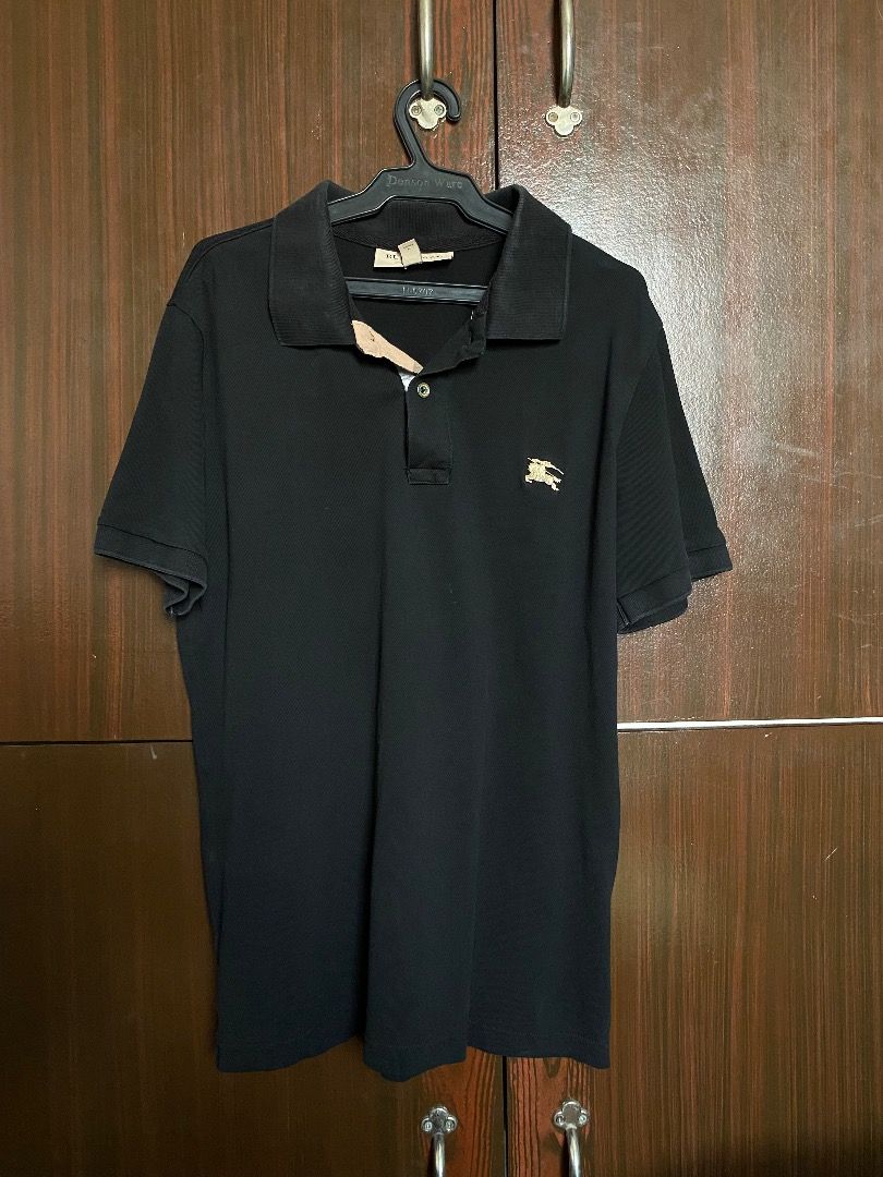 Burberry Black Englash Polo Shirt (Category: Tshirts & Polo Shirts ) located in Caloocan City. Submitted by sporki (Listing ID 1435558980, Image 1). Description: Burberry England Polo Shirt dimes: 16x23.
