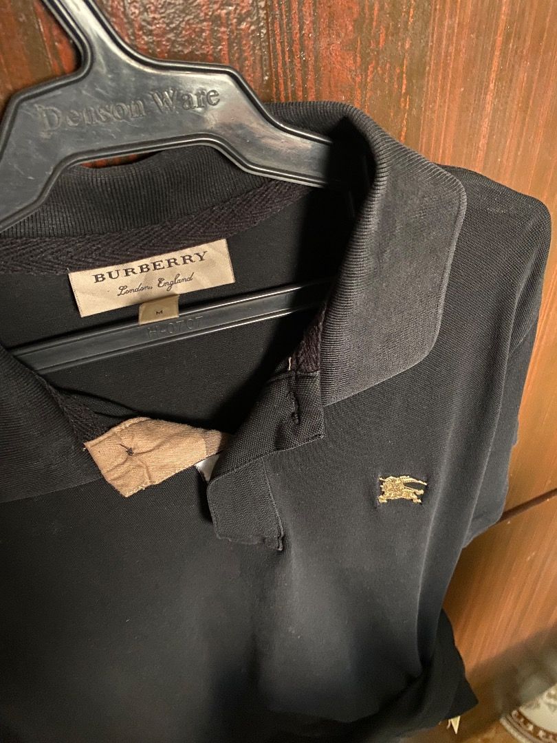 Burberry Black Englash Polo Shirt (Category: Tshirts & Polo Shirts ) located in Caloocan City. Submitted by sporki (Listing ID 1435558980, Image 3). Description: Burberry England Polo Shirt dimes: 16x23.