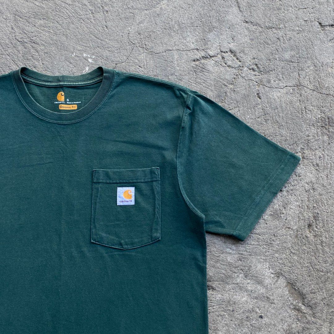 Carhartt Hunter Green Pocket Tee (Category: Tshirts & Polo Shirts ) located in Calamba. Submitted by thriftguide (Listing ID 1435633653, Image 3). Description: Carhartt Hunter Green Pocket Tee Authentic Excellent Condition Issue: May 1 maliit na butas sa hem Small on tag, Fits Large Width: 21” Length: 28.5”.