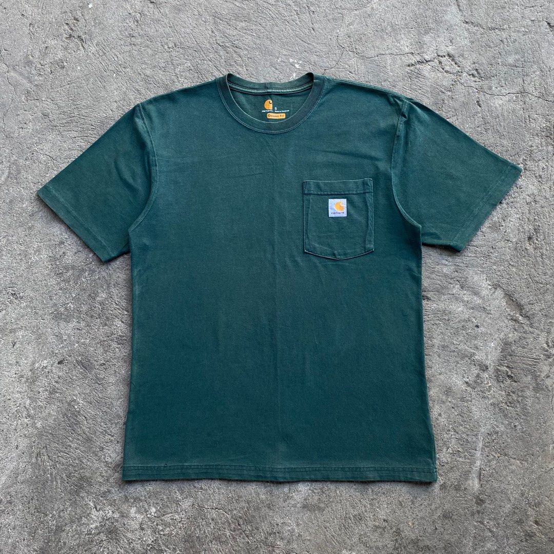 Carhartt Hunter Green Pocket Tee (Category: Tshirts & Polo Shirts ) located in Calamba. Submitted by thriftguide (Listing ID 1435633653, Image 1). Description: Carhartt Hunter Green Pocket Tee Authentic Excellent Condition Issue: May 1 maliit na butas sa hem Small on tag, Fits Large Width: 21” Length: 28.5”.