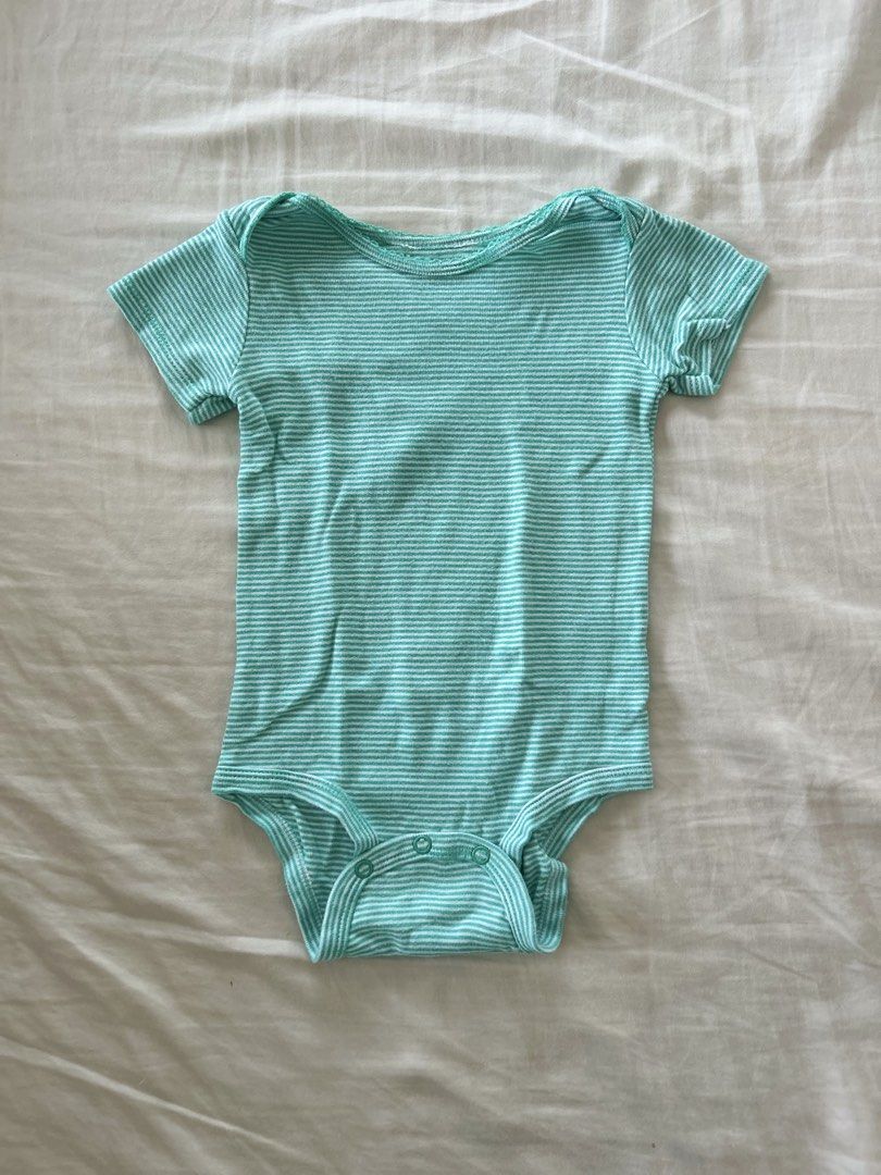 Carter's Striped Onesie - 18 Months (Category: Babies & Kids Fashion) located in Quezon City. Submitted by jen_o (Listing ID 1435529938, Image 1). Description: - Carter's onesie for 18-month-old babies. - Light blue and white stripes. - Short sleeves. - Convenient snap closures at the bottom. - Made from soft, comfortable fabric. - Perfect for daily use..