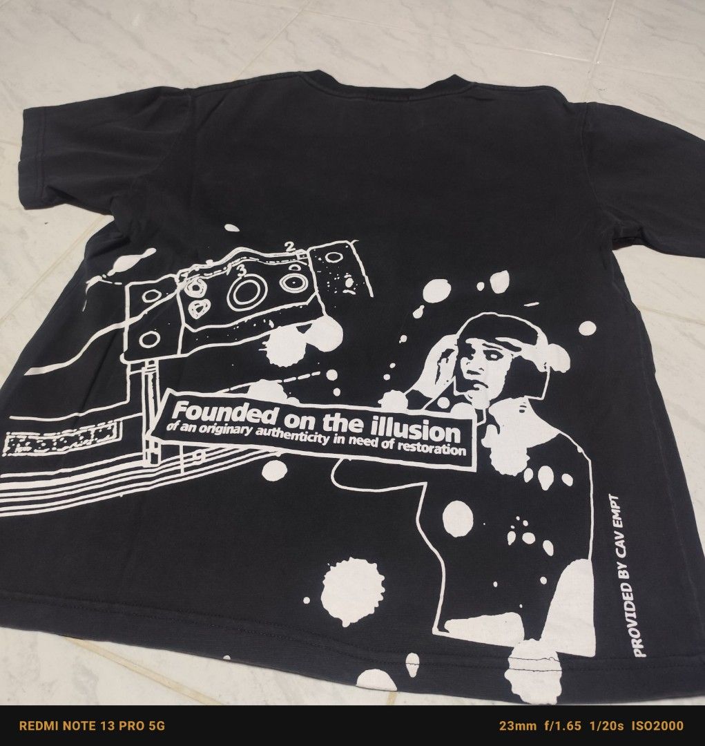 Cav Empt Graphic T-shirt Japan (Category: Tshirts & Polo Shirts ) located in Manila. Submitted by buyybustt (Listing ID 1435645985, Image 3). Description: - Black Cav Empt T-shirt - Graphic print on front and back - Crew neck and short sleeves - Back print includes text: "Founded on the illusion of an originality authenticity in need of restoration" and "PROVIDED BY CAV EMPT" - Made of 100% cotton.