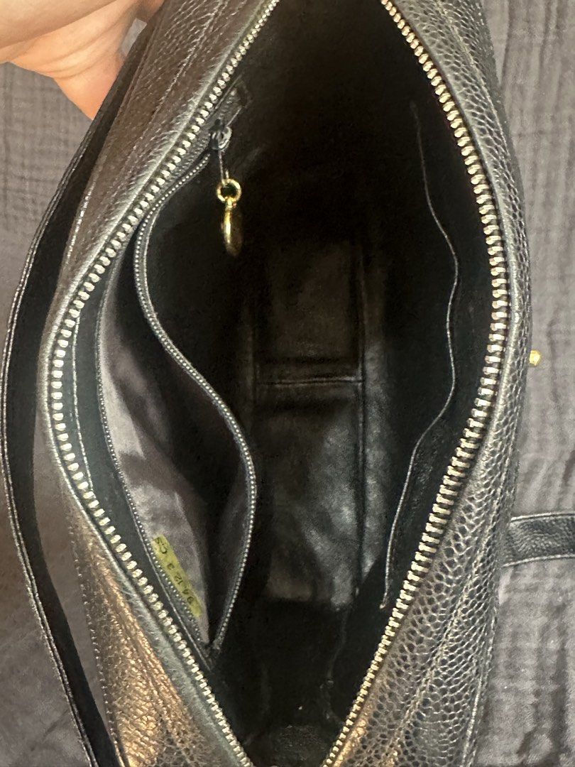Chanel Caviar Leather Sqaure Bag (Category: Luxury Bags & Wallets) located in Mandaluyong City. Submitted by marceditems (Listing ID 1435713859, Image 3). Description: - Authentic Chanel shoulder bag - Made from black caviar leather - 24k gold plated hardware and CC turn-lock - Leather shoulder strap -Top zipper closure - with Multiple compartments, zippered pocket - Made in Italy - Hologram intact - no noticeable flaws.