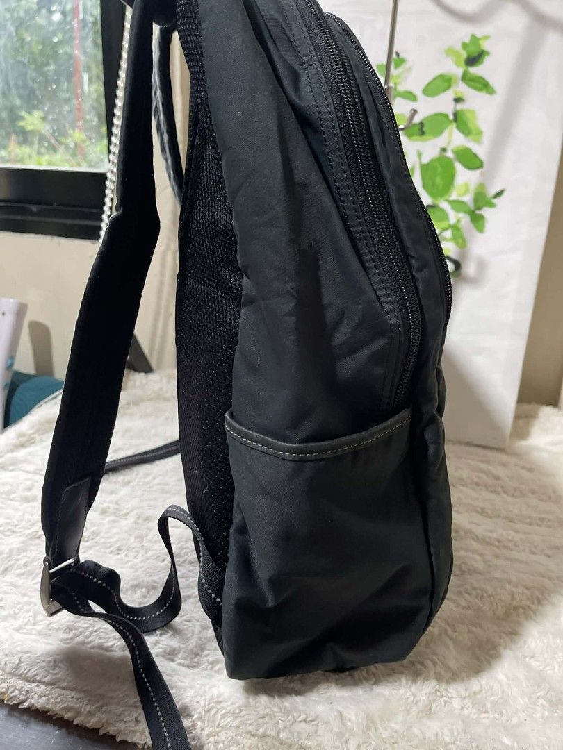 Coach Varick Nylon Backpack Bag Original (Category: Backpacks) located in Naawan. Submitted by twillycalledprelovedbags (Listing ID 1435600138, Image 3). Description: issue: 2 missing rubber sa puller ykk zipper, creed.
