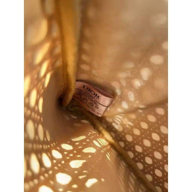 Dior rattan clutch (Category: Luxury Bags & Wallets) located in Santa Rosa. Submitted by loveartsyluxe (Listing ID 1435694331, Image 3). Description: Free sf No haggling please as we follow the SRP. No rush shippinh.