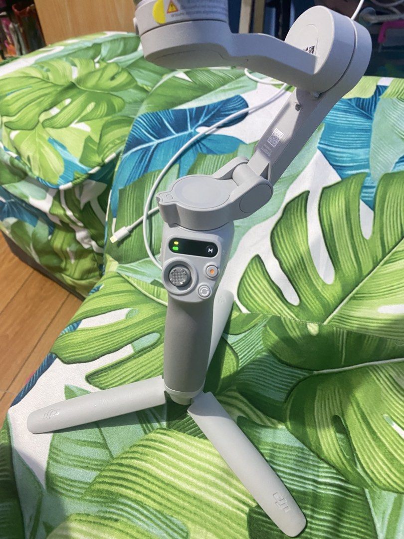 DJI OM 4 Smartphone Gimbal Stabilizer (Category: Gimbals & Stabilizers ) located in Paranaque City. Submitted by syndra7 (Listing ID 1435553025, Image 1). Description: Can do lalamove if within metro manila (buyer will shoulder sf) - DJI OM 4 smartphone gimbal stabilizer - Foldable design - Built-in tripod - Features power and control buttons - Gray color - Designed to stabilize smartphone footage.