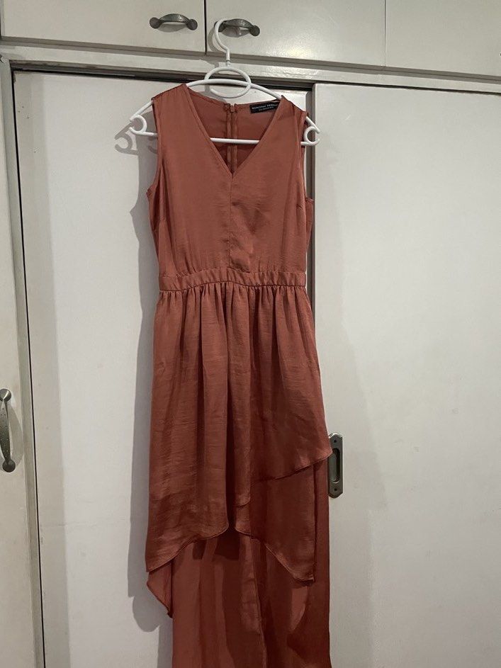 Dorothy Perkins Asymmetrical Dress (Category: Dresses) located in Makati City. Submitted by Pinksisters (Listing ID 1435640403, Image 1). Description: - Dorothy Perkins dress - V-neckline - Asymmetrical hem - Back zipper closure - Sleeveless - Solid color, satin-like material - US size 6, EUR 38, UK 10.