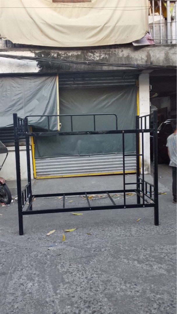 DOUBLE DECK BED FRAME (Category: Bed Frames & Mattresses) located in Manila. Submitted by kemberlyjo78499 (Listing ID 1435617895, Image 1). Description: 🔥 FOR SALE: Matibay na Double Deck Bed Frame 🔥 ✔ Heavy Duty bakal frame ✔ Space saver – perfect sa maliit na kwarto ✔ Malinis at matibay ang gawa ✔ Safe at sturdy, pang matagalan ✔ Modern black finish, bagay sa kahit anong room setup 💯 Sulit na sulit para sa pamilya, boarding house, dorm o pau