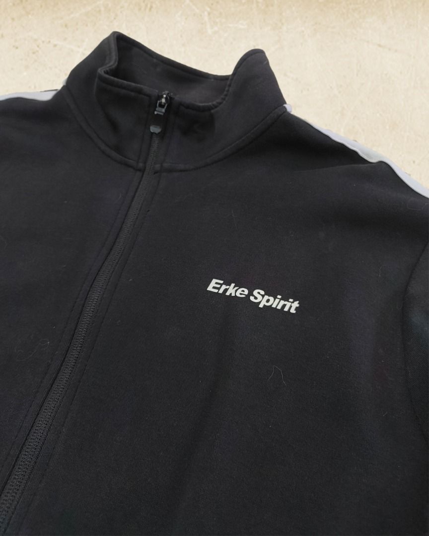 Erke Spirit Black Zip Up Jacket (Category: Coats, Jackets and Outerwear) located in Naga. Submitted by feral.thrift (Listing ID 1435631310, Image 3). Description: Erke Spirit Black Zip Up Jacket 28.5 x 23.5 8/10 Fade in Inner Neckline.