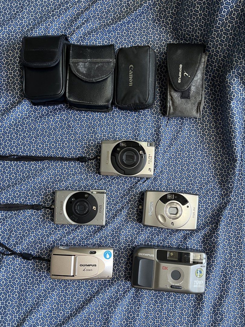Film Camera (Category: Cameras) located in Manila. Submitted by lliamlim (Listing ID 1435552931, Image 1). Description: * canon elph 370z * Canon Ixus Z65 * Canon Ixus APS (loose flash popup) * Olympus zoom75 * Olympus trip md3st (last used december 2025) Message me if you have more inquires, open to negotiate. The film camera are unsure if still working..