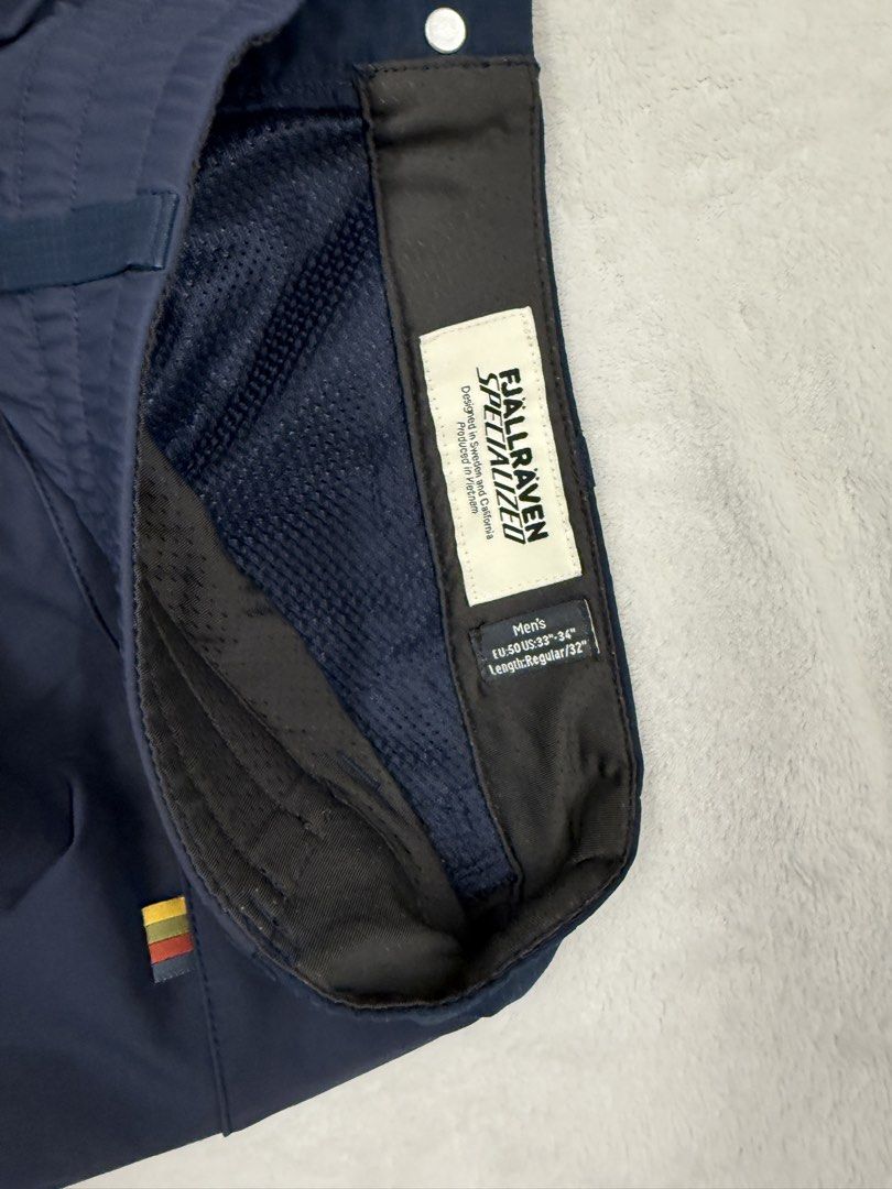Fjallraven Specialized Men's Pants (Category: Trousers) located in Singapore. Submitted by awhite102204139 (Listing ID 1435581007, Image 3). Description: - Worn once, didn’t like the fit, clearing my closet - RTP $200 - Stylish blue color - Comfortable fit - Multiple pockets and zippers for functionality - Perfect for outdoor activities or casual wear - For reference - https://www.competitivecyclist.com/specialized-s-f-riders-hybrid-trousers-mens
