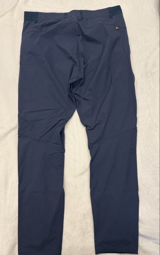 Fjallraven Specialized Men's Pants (Category: Trousers) located in Singapore. Submitted by awhite102204139 (Listing ID 1435581007, Image 2). Description: - Worn once, didn’t like the fit, clearing my closet - RTP $200 - Stylish blue color - Comfortable fit - Multiple pockets and zippers for functionality - Perfect for outdoor activities or casual wear - For reference - https://www.competitivecyclist.com/specialized-s-f-riders-hybrid-trousers-mens