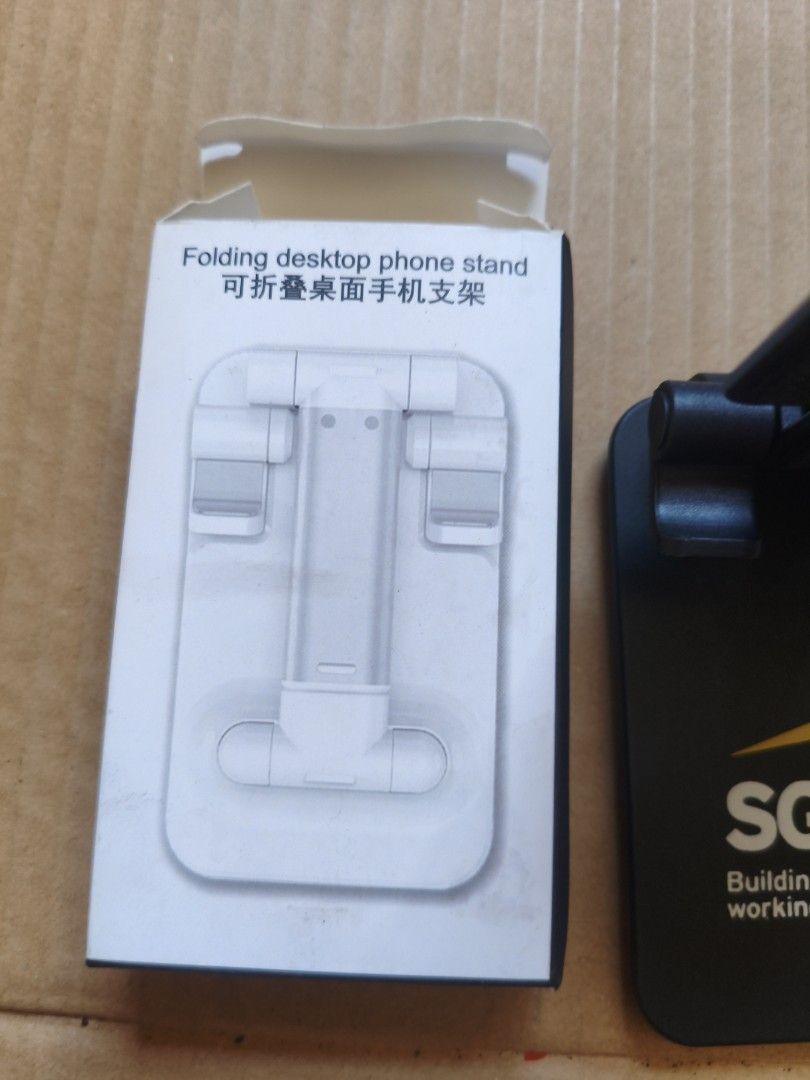 Folding Lifting Bracket Desktop Phone Stand (Category: Mounts & Holders) located in Pasig City. Submitted by coolphoenix-29ac (Listing ID 1435545689, Image 3). Description: .