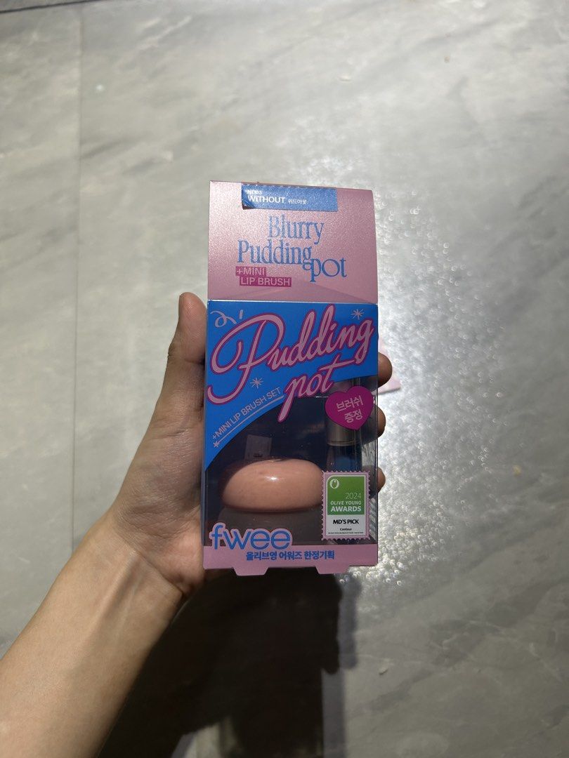 Fwee blurry pudding pot with mini lip brush (Category: Makeup) located in Rizal. Submitted by reyshishibal (Listing ID 1435611710, Image 2). Description: SHADE: ND03 WITHOUT - brandnew - unsealed the plastic box just to check if there is damage. The lip blur pot isn’t opened yet - can send video condi - authentic official, scan the barcode to check authenticity - est sf if jnt: around 50 only ✅installment (original price+ 100) in 2 months.