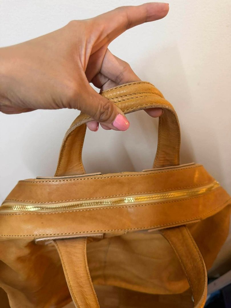 Givenchy Nightingale Handbag (Category: Luxury Bags & Wallets) located in Caloocan City. Submitted by ceciledij37038 (Listing ID 1435671061, Image 2). Description: - Authentic Large Givenchy Nightingale handbag - Color: Tan - Features: - Top zipper closure - Double top handles - Detachable shoulder strap - Interior: Main compartment and multiple pockets - Hardware: Gold-tone - Visible Givenchy logo inside - Negotiable.