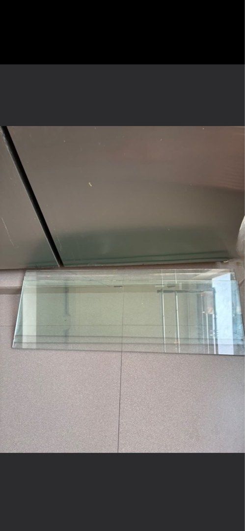 Glass Panel - Rectangular Shape (Category: Other Home Furniture) located in Singapore. Submitted by happywinnie (Listing ID 1435579471, Image 2). Description: - Rectangular glass panel - Suitable for shelves or replacement - 11.2 inches X 34.8 inches - 3 pcs Available - 3 for $19 .