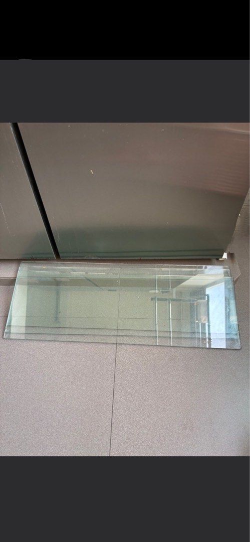 Glass Panel - Rectangular Shape (Category: Other Home Furniture) located in Singapore. Submitted by happywinnie (Listing ID 1435579471, Image 1). Description: - Rectangular glass panel - Suitable for shelves or replacement - 11.2 inches X 34.8 inches - 3 pcs Available - 3 for $19 .