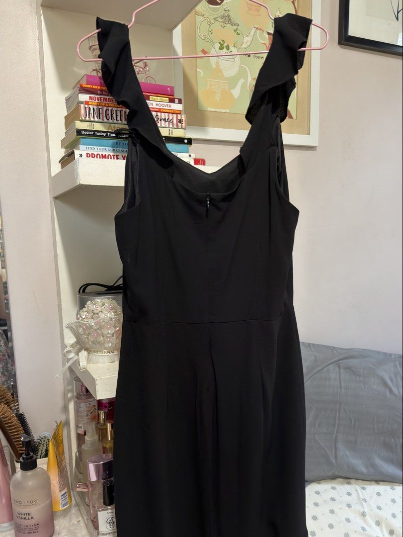 GTWFAB Black Ruffle Dress - Size L (Category: Dresses) located in Apalit. Submitted by ic_declutter (Listing ID 1435604442, Image 2). Description: - GTWFAB black dress - V-neck design - Ruffle detailing on straps - Fitted bodice - Asymmetrical hemline - Zipper closure at the back - Size L.