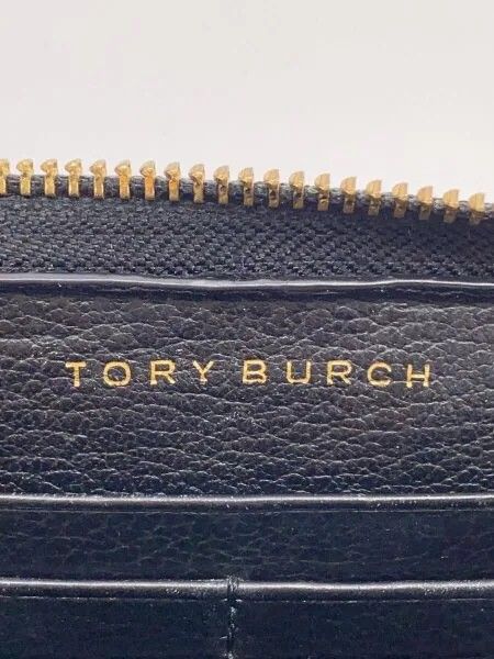 Guaranteed Authentic Tory Burch Black Zip Around Wallet (Category: Luxury Bags & Wallets) located in Paranaque City. Submitted by authenticluxejapan888 (Listing ID 1435298416, Image 2). Description: - Tory Burch zip-around wallet, very good condition guaranteed authentic from Japan; very clean inside & outside like new pwede pangregalo - Classic black color - Features the iconic Tory Burch logo - Made of smooth soft pebbled leather - Gold-toned h