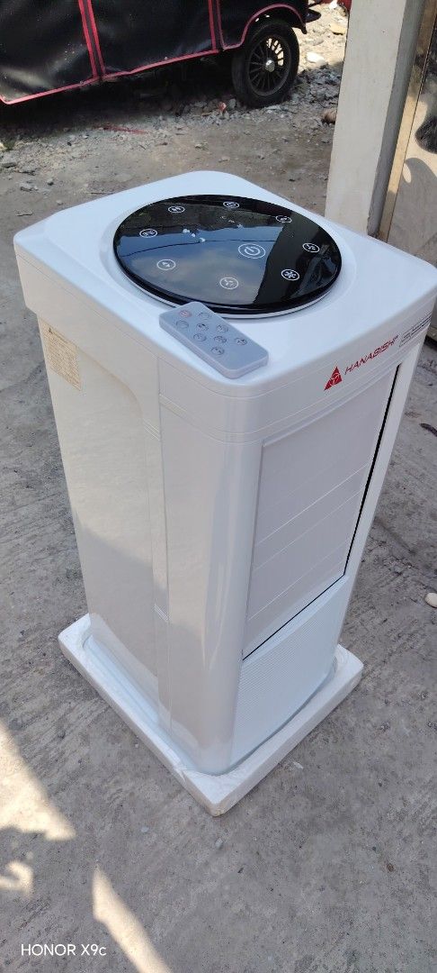 Hanabishi Air Purifier with Remote (Category: Air Purifiers & Dehumidifiers) located in Meycauayan. Submitted by steve_buy_and_sell (Listing ID 1435597088, Image 3). Description: - Hanabishi air cooler 7Litters water tank capacity - Sleek white design - Touch panel control - Includes remote control - Equipped with wheels for easy movement Cash on delivery Call or text 09289464485 09943518702 - Features air filter and vent.
