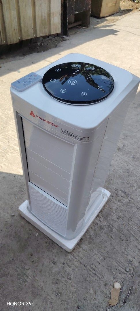 Hanabishi Air Purifier with Remote (Category: Air Purifiers & Dehumidifiers) located in Meycauayan. Submitted by steve_buy_and_sell (Listing ID 1435597088, Image 2). Description: - Hanabishi air cooler 7Litters water tank capacity - Sleek white design - Touch panel control - Includes remote control - Equipped with wheels for easy movement Cash on delivery Call or text 09289464485 09943518702 - Features air filter and vent.