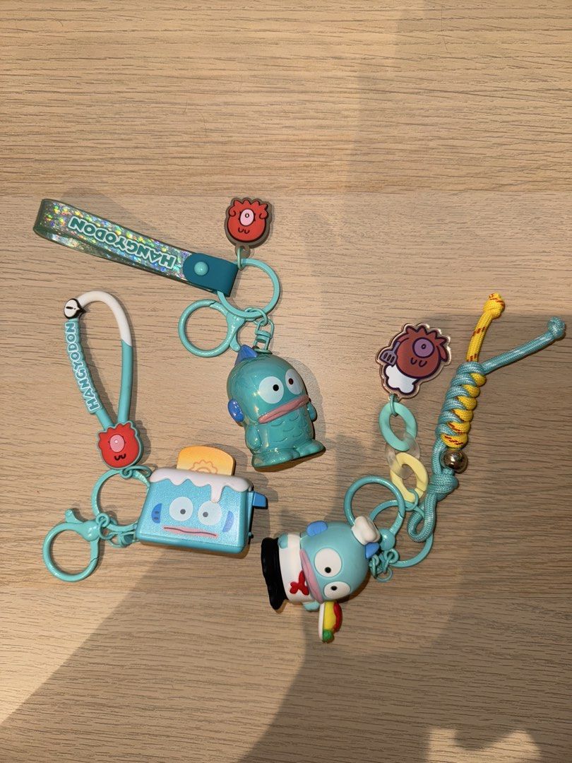 Hangyodon Keychains Set (Category: Character Goods) located in Singapore. Submitted by alexandra.27 (Listing ID 1435624708, Image 1). Description: 7 each, all for 20 - Adorable Hangyodon keychains! - Set includes multiple keychains. - Features Hangyodon and other cute designs. - Perfect for keys, bags, and accessories. .