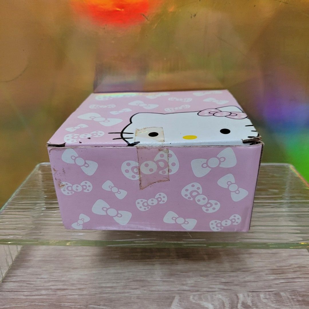 Hello Kitty ceramic bowls matching spoons.443185414611947526