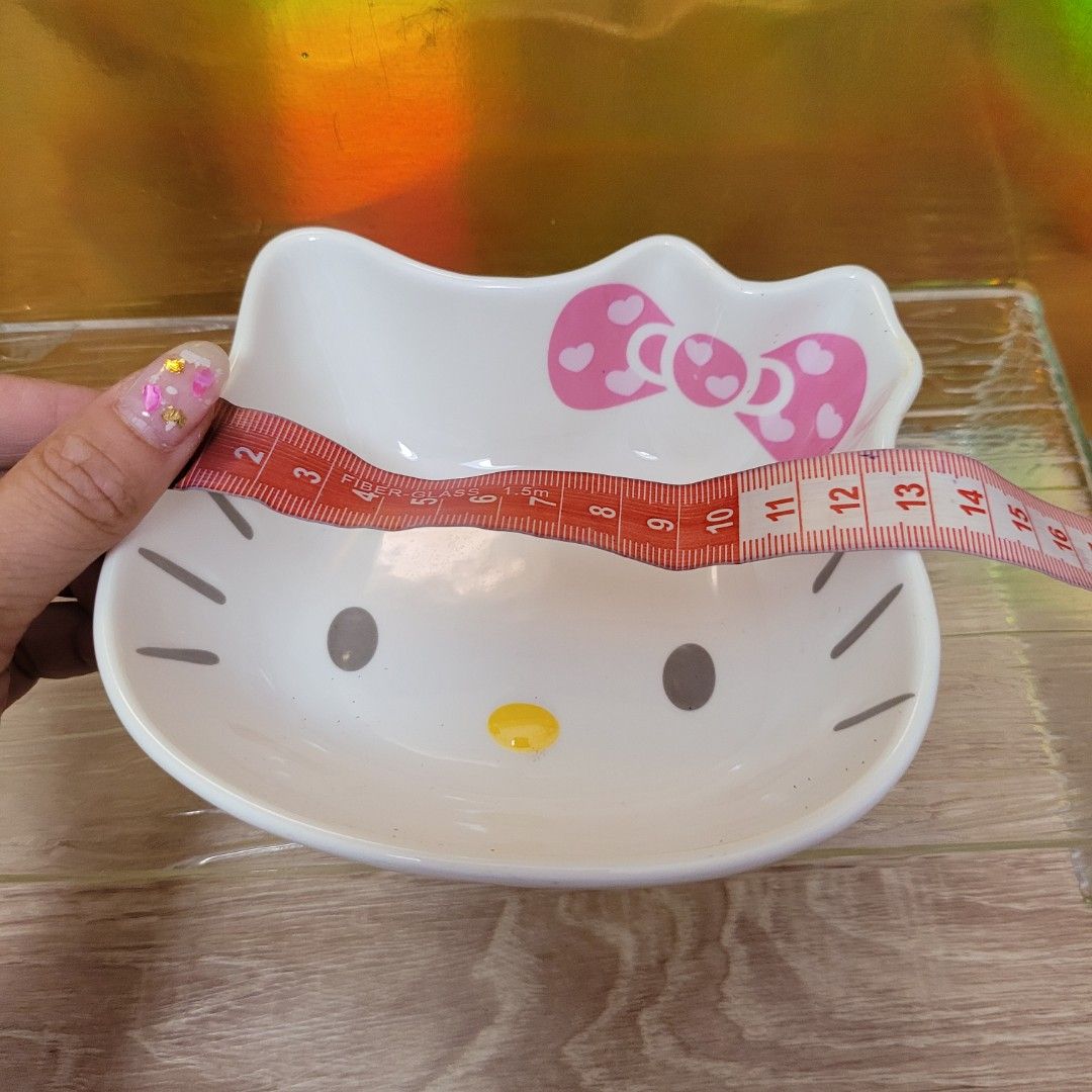 Hello Kitty ceramic bowls matching spoons.443185414611947524