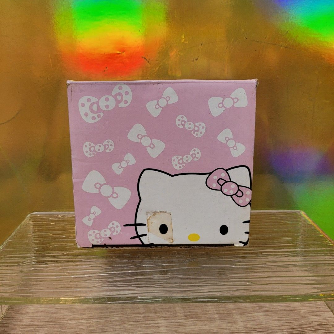 Hello Kitty ceramic bowls matching spoons.443185414611947525