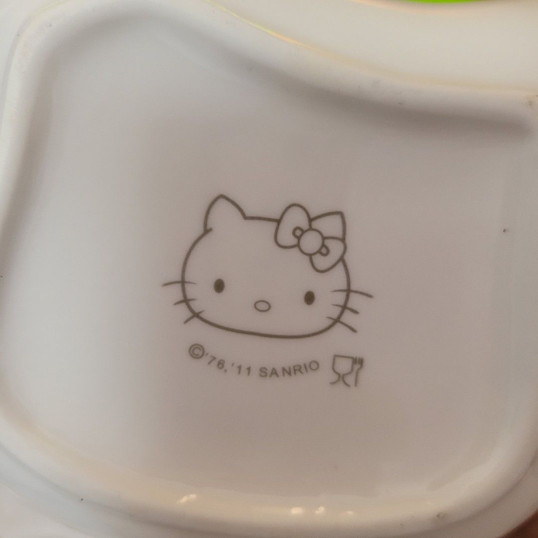 Hello Kitty ceramic bowls matching spoons.443185414611947523