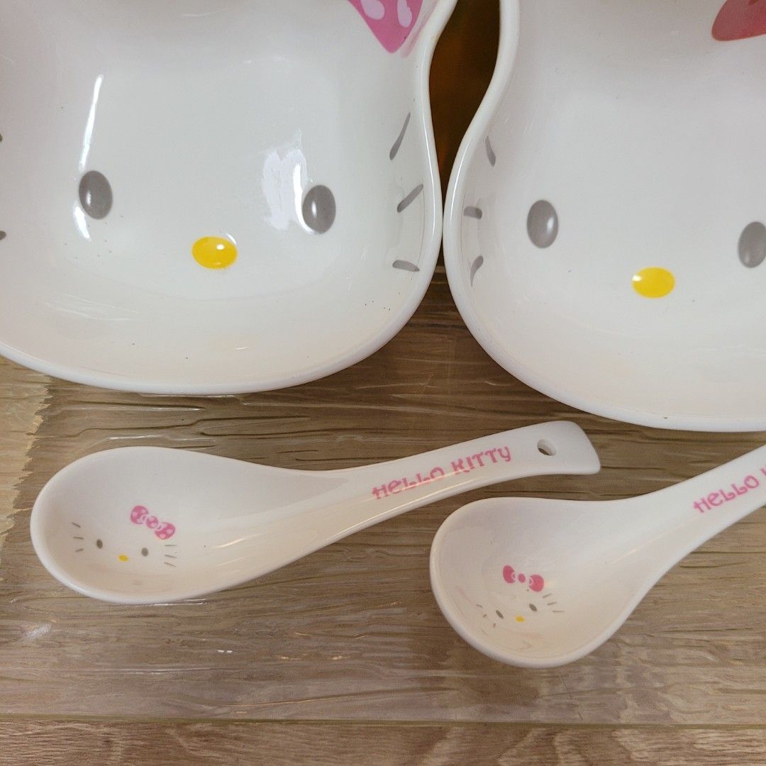 Hello Kitty ceramic bowls matching spoons.443185414611947522
