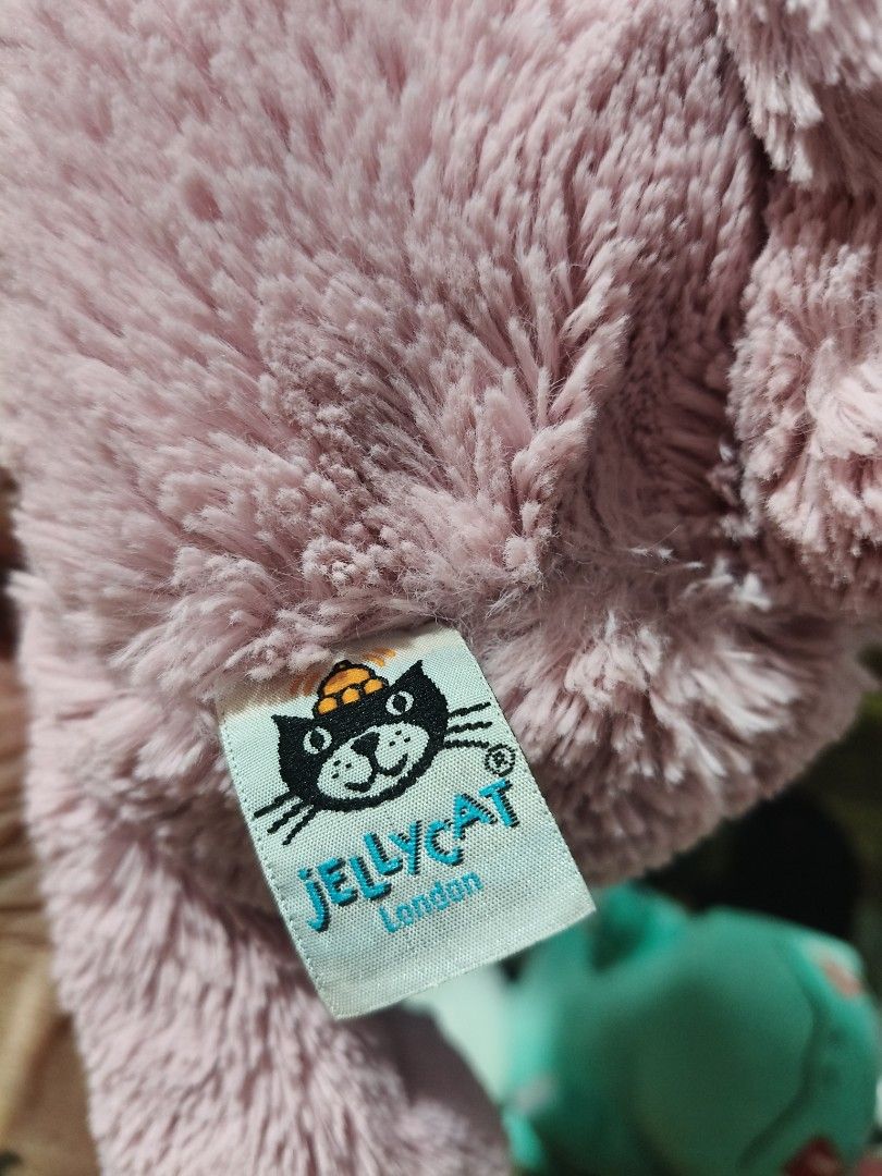 Jellycat Bunny Stuffed Toy (Category: Plushies & Soft Toys) located in Manila. Submitted by kathylandia (Listing ID 1435710438, Image 2). Description: - Jellycat bunny plush toy - Soft, cuddly pink fur - Features charming floral patterned ears - Authentic Jellycat London product - Ideal for children or collectors.