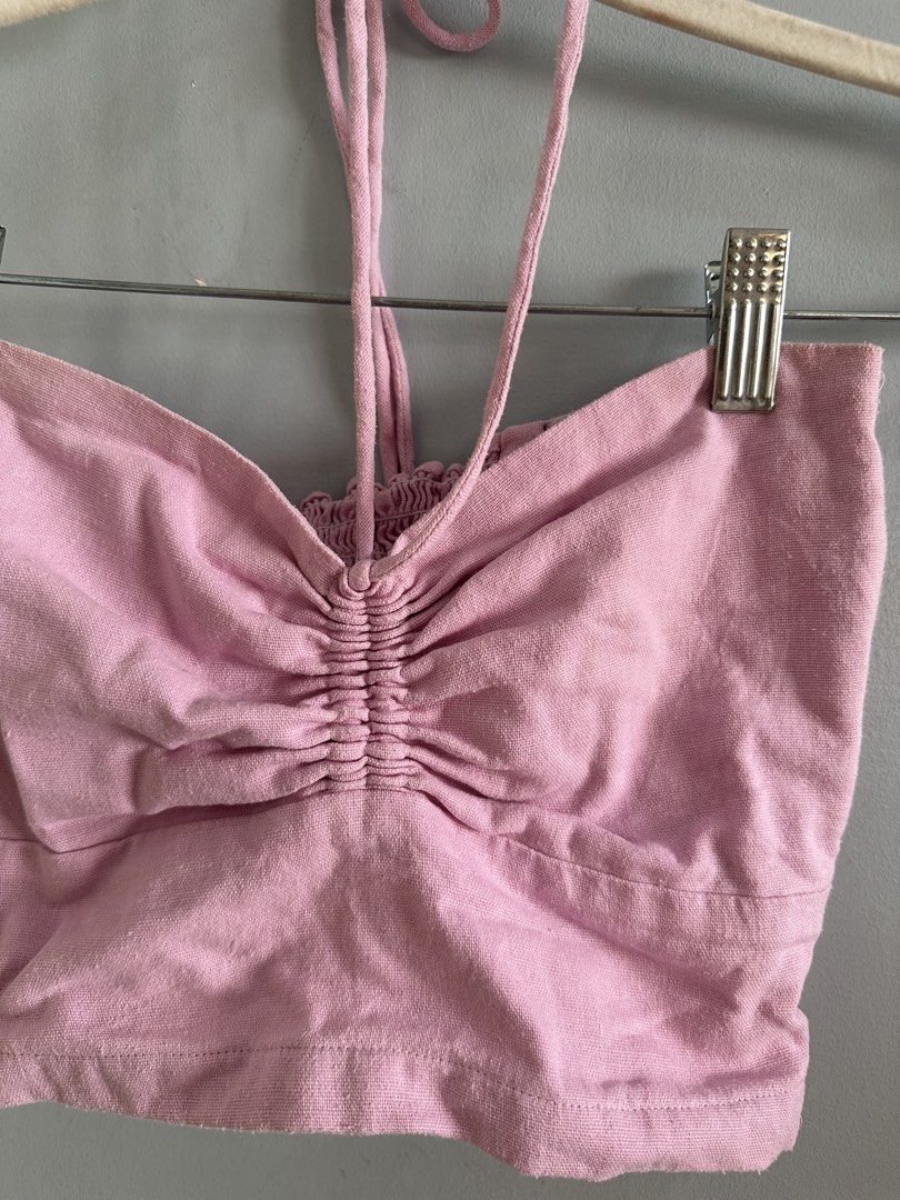 Kalina Pink Halter Top (Category: Sleeveless) located in Quezon City. Submitted by nadine_declutter (Listing ID 1435590887, Image 2). Description: -ruched front, smocked back, side zipper - adjustable halter straps - cropped - best fits small frames - perfect for hot summer days.