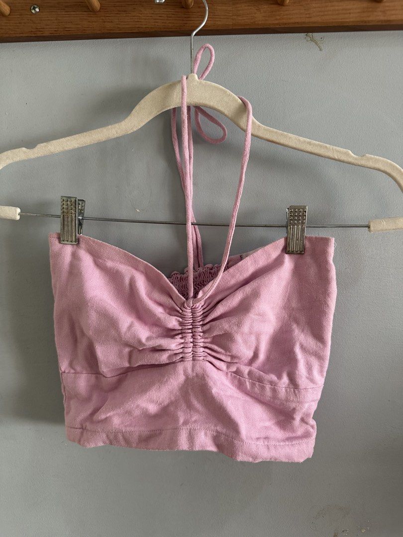 Kalina Pink Halter Top (Category: Sleeveless) located in Quezon City. Submitted by nadine_declutter (Listing ID 1435590887, Image 1). Description: -ruched front, smocked back, side zipper - adjustable halter straps - cropped - best fits small frames - perfect for hot summer days.