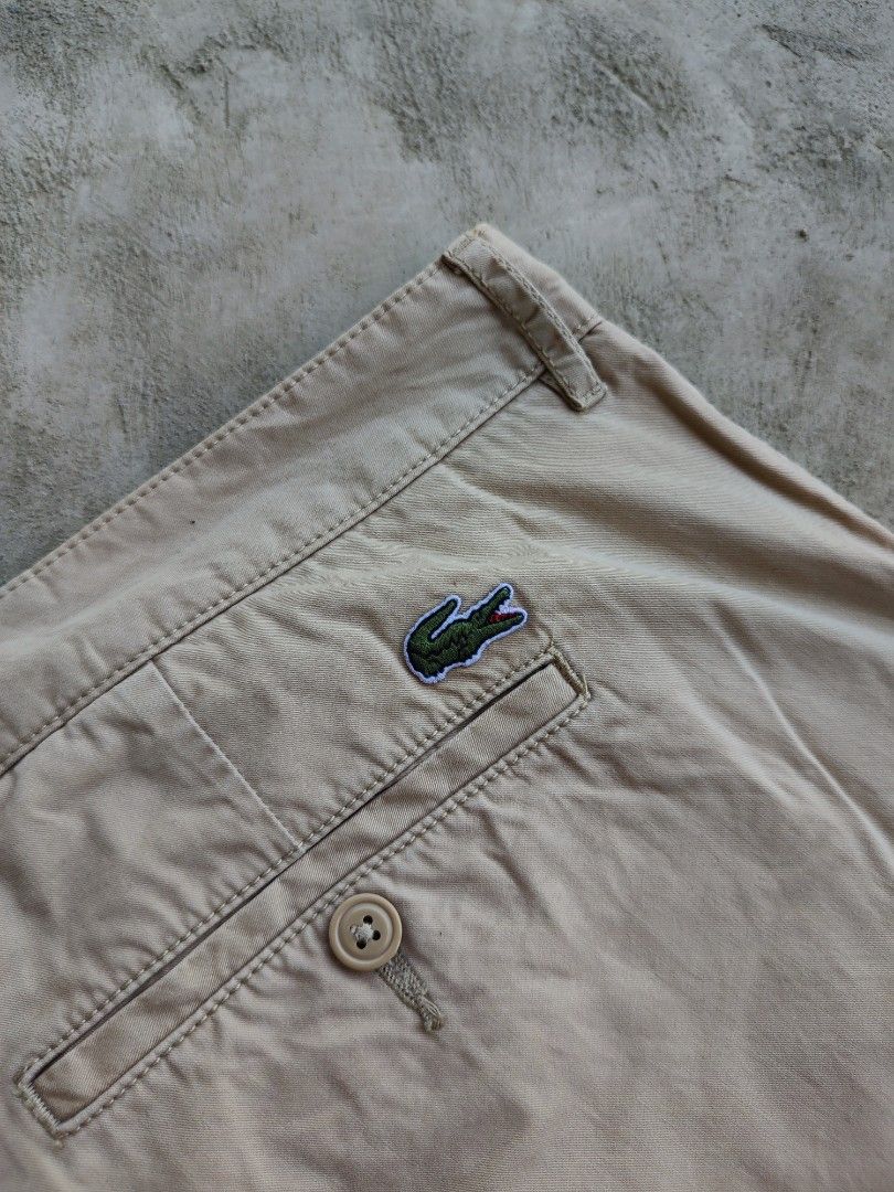 Lacoste Slim Fit Khaki Pants (Category: Jeans) located in Infanta. Submitted by lloydthrift (Listing ID 1435672648, Image 3). Description: - Lacoste slim fit pants - Khaki color - Size 50 - 100% cotton - Classic five-pocket design - Button closure - Iconic Lacoste logo - Designed in France dime's: 40 x 38 x 17 condition: Very Good Color rate: 9/10.
