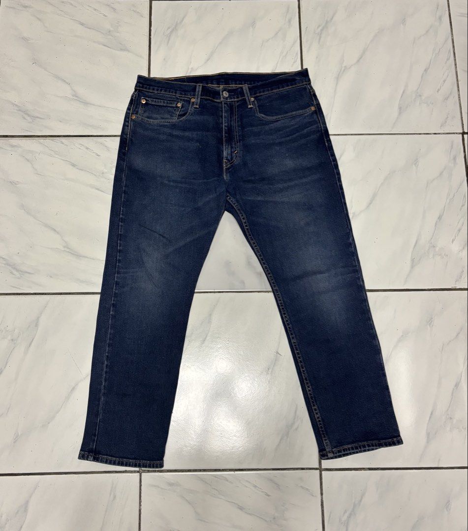 Levi's 502 Jeans | W34 L29 (Category: Jeans) located in Bayombong. Submitted by calthrift.us (Listing ID 1435614912, Image 1). Description: - Levi's 502 jeans - Dark blue wash - Size: W34 L29 - Straight leg fit - Classic five-pocket design - Levi's red tab present.