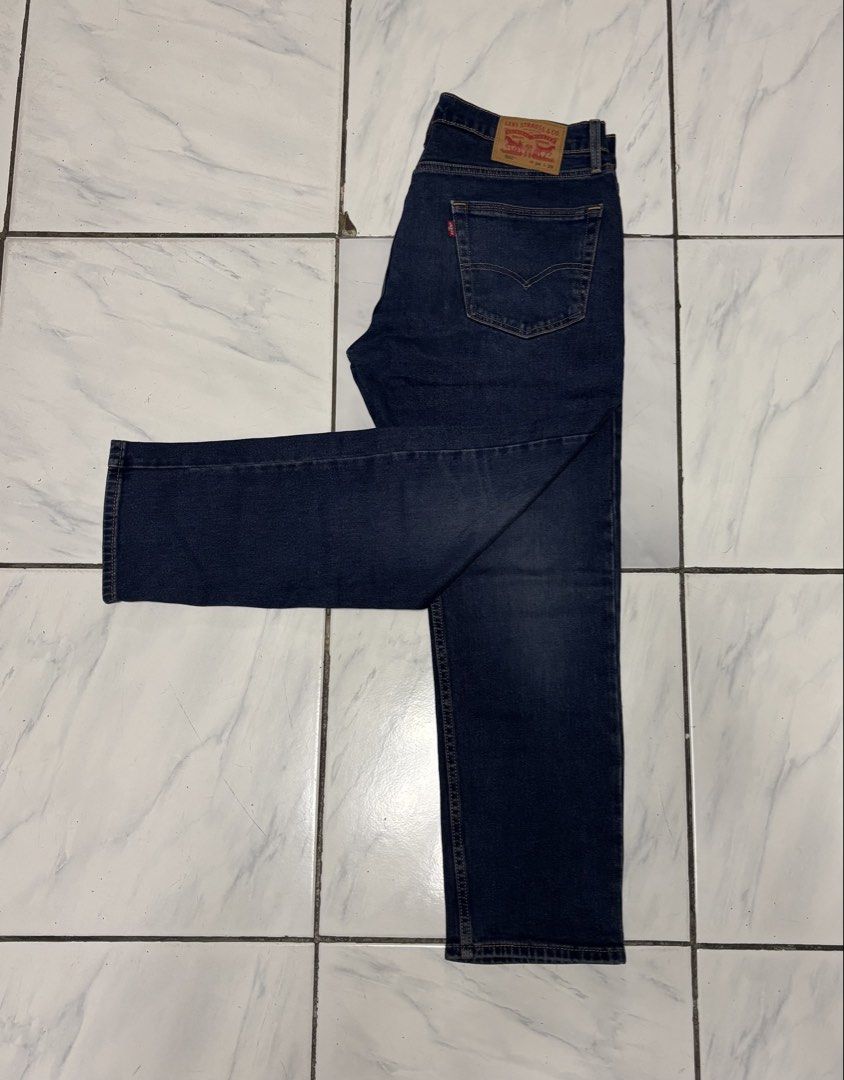 Levi's 502 Jeans | W34 L29 (Category: Jeans) located in Bayombong. Submitted by calthrift.us (Listing ID 1435614912, Image 2). Description: - Levi's 502 jeans - Dark blue wash - Size: W34 L29 - Straight leg fit - Classic five-pocket design - Levi's red tab present.
