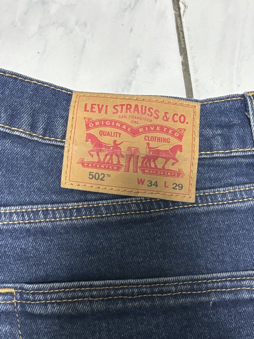Levi's 502 Jeans | W34 L29 (Category: Jeans) located in Bayombong. Submitted by calthrift.us (Listing ID 1435614912, Image 3). Description: - Levi's 502 jeans - Dark blue wash - Size: W34 L29 - Straight leg fit - Classic five-pocket design - Levi's red tab present.