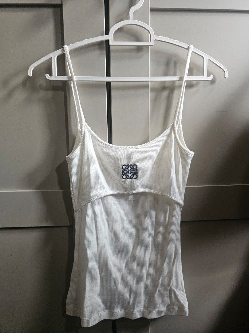 Loewe Ribbed Tank Top (Category: Luxury Apparel) located in Caloocan City. Submitted by mymyg (Listing ID 1435540413, Image 1). Description: - Authentic Loewe white ribbed tank top - bought from le bon marche (shares a receipt with the other loewe top posted) - Features the Loewe logo - Made from a lightweight, textured fabric - RFS i am now 2 size larger!.
