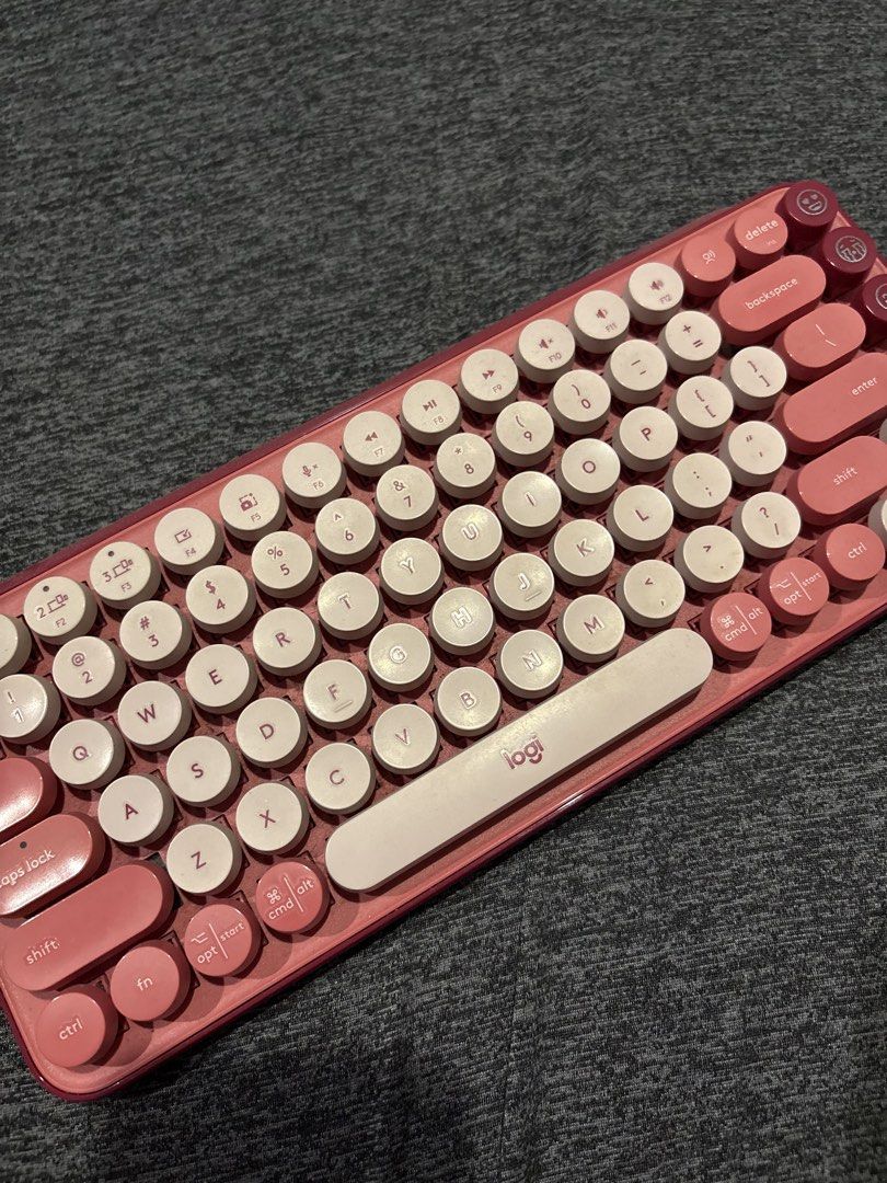 Logitech keyboard (Category: Computer Keyboard) located in Manila. Submitted by junioangel61287 (Listing ID 1435580155, Image 1). Description: - Logitech POP Keys keyboard - Stylish design - Retro round keys - Perfect for a cute and functional setup.