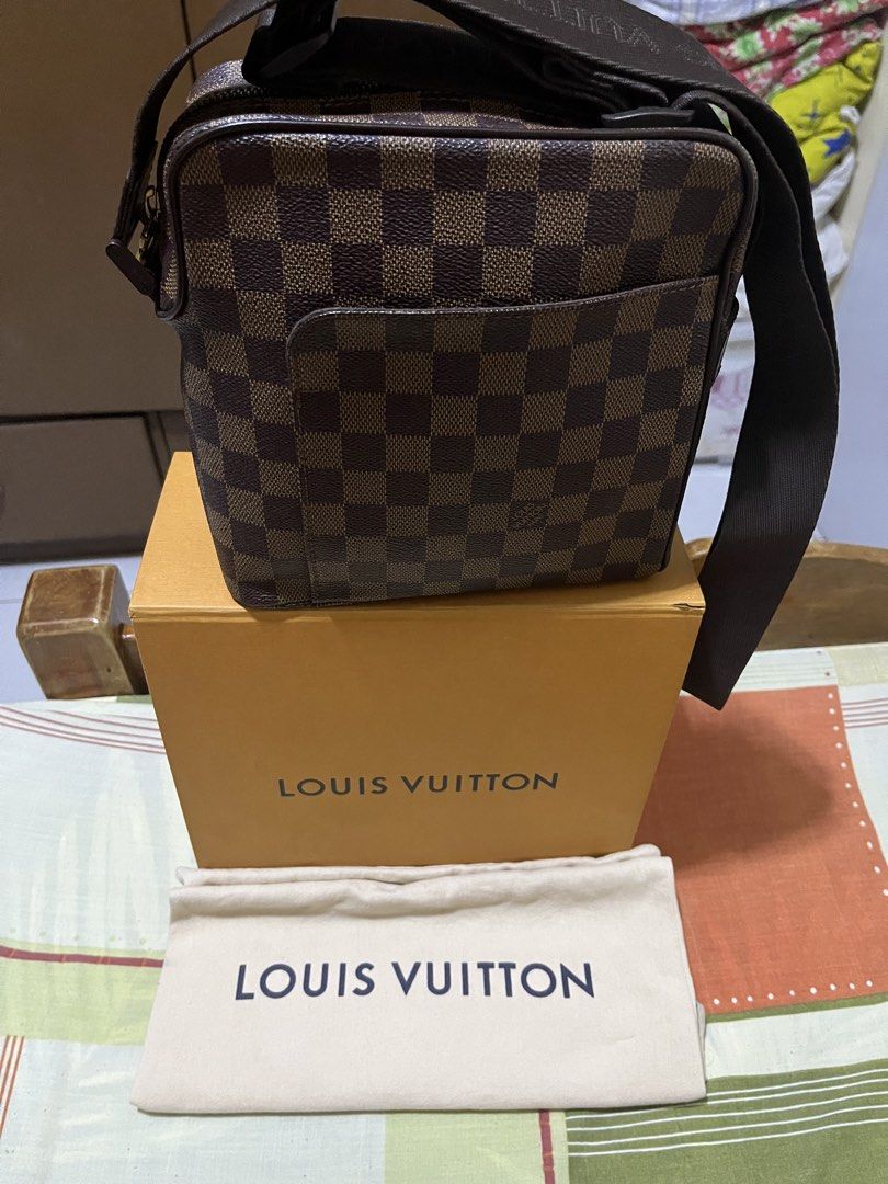 Louis Vuitton Damier OLAV Bag (Category: Luxury Bags & Wallets) located in Manila. Submitted by jankbaiteh05162 (Listing ID 1435604038, Image 1). Description: - Authentic Louis Vuitton Damier Ebene crossbody bag - Classic Damier Ebene checkered pattern - Includes original box and dust bag - Features a front pocket and zip closure - Adjustable strap.
