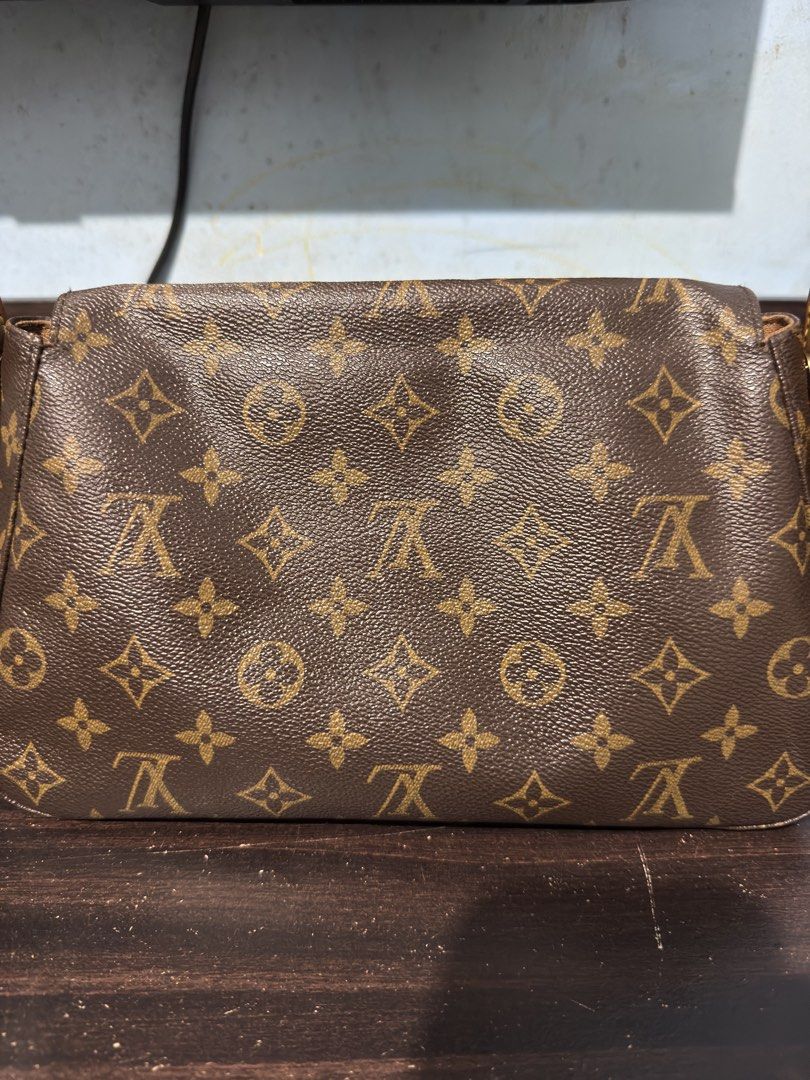Louis Vuitton Monogram Shoulder Bag (Category: Luxury Bags & Wallets) located in Iloilo. Submitted by kristena87 (Listing ID 1435618044, Image 2). Description: - Authentic Louis Vuitton shoulder bag - Classic Monogram canvas - Flap closure - Single handle - Interior zippered pocket - Leather handle with yellow stitching - Iconic LV monogram pattern.