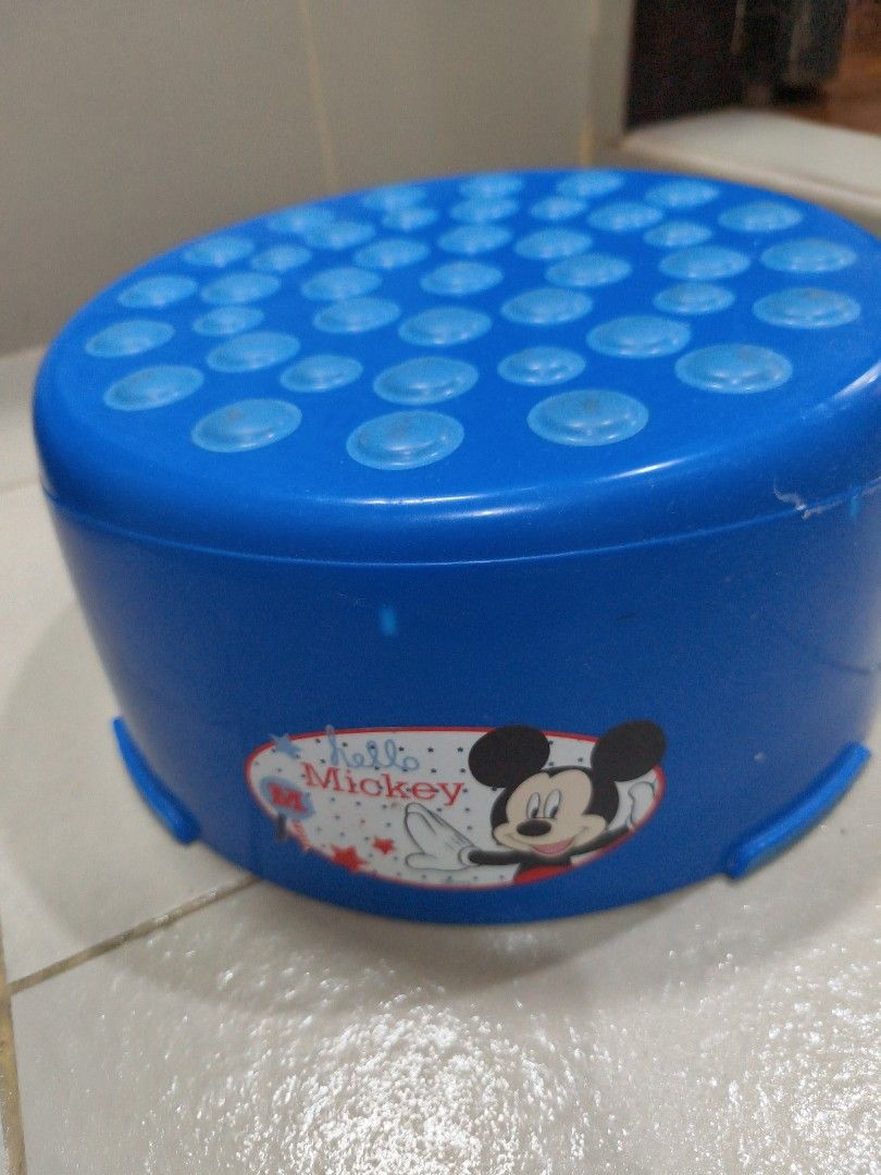 Mickey Mouse Step Stool (Category: Chairs) located in Borongan. Submitted by khakiskye (Listing ID 1435543560, Image 1). Description: - Blue step stool with Mickey Mouse design - Textured top for safety - Sturdy and stable base - Originally priced at 699 PHP - Ideal for children or various household tasks - Compact and easy to move.