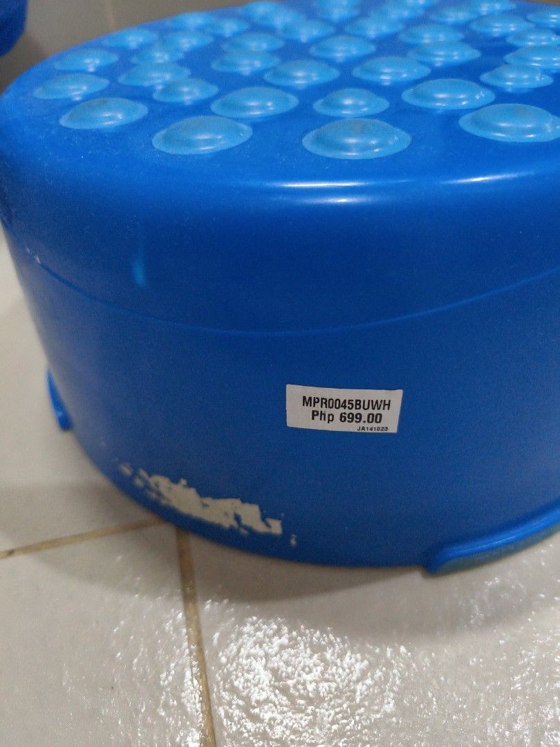 Mickey Mouse Step Stool (Category: Chairs) located in Borongan. Submitted by khakiskye (Listing ID 1435543560, Image 2). Description: - Blue step stool with Mickey Mouse design - Textured top for safety - Sturdy and stable base - Originally priced at 699 PHP - Ideal for children or various household tasks - Compact and easy to move.
