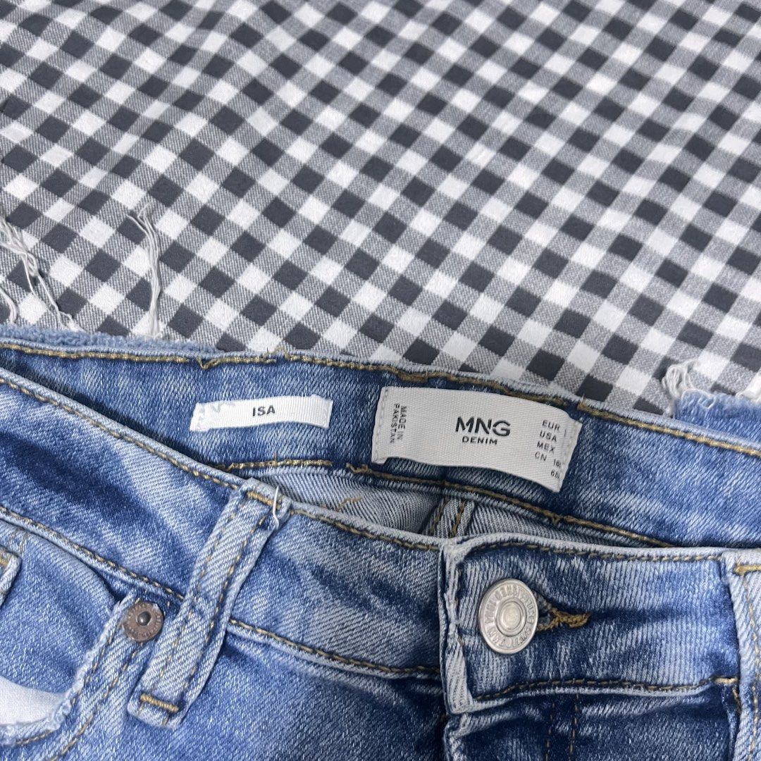 MNG Skinny Denim Jeans (Category: Jeans) located in Valenzuela. Submitted by 99jch (Listing ID 1435600508, Image 2). Description: - MNG blue denim jeans (ISA) - Classic five-pocket design - Button and zip closure - Raw hem detail - Size indicated on label - Perfect for everyday wear - Size 29-30 Dm me for more pics of item! 💞.