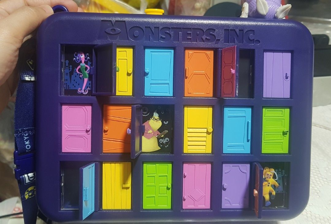 Monsters Inc. Door Box Popcorn Bucket (Category: Other Merchandise) located in Manila. Submitted by jhs31 (Listing ID 1435627534, Image 3). Description: - Collectible Monsters, Inc. door box popcorn bucket - Doors open to reveal scenes from the movie - With strap -Preloved but still in good condition Location: Manila Pm for more details..