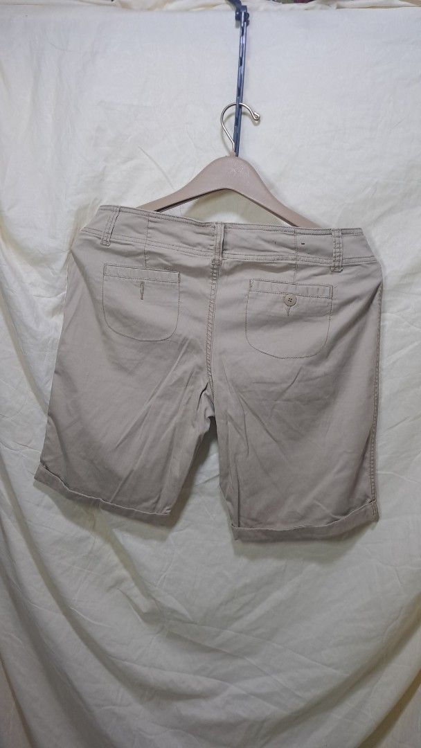 Mossimo Supply Co. Khaki Shorts - Size 11 (Category: Shorts) located in Davao. Submitted by bravemoon_556cd5 (Listing ID 1435525090, Image 2). Description: - Brand: Mossimo Supply Co. - Size: 11 - Waist: 34 - Length: 18 - Material: 98% Cotton, 2% Spandex - Features: Button closure, multiple pockets - Color: Khaki (Neutral) - Made in Bangladesh.