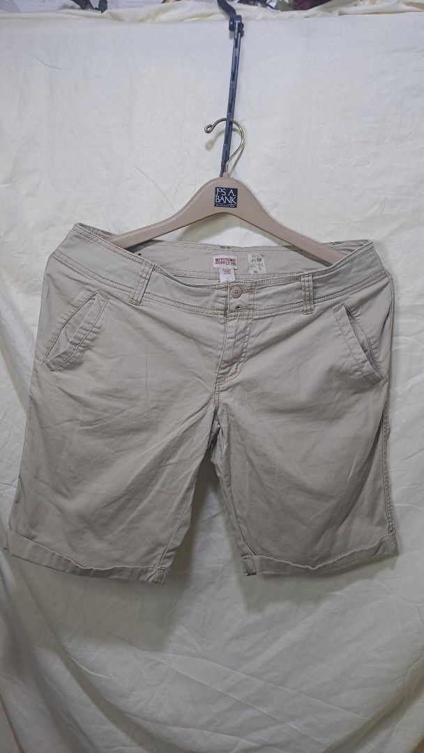 Mossimo Supply Co. Khaki Shorts - Size 11 (Category: Shorts) located in Davao. Submitted by bravemoon_556cd5 (Listing ID 1435525090, Image 1). Description: - Brand: Mossimo Supply Co. - Size: 11 - Waist: 34 - Length: 18 - Material: 98% Cotton, 2% Spandex - Features: Button closure, multiple pockets - Color: Khaki (Neutral) - Made in Bangladesh.