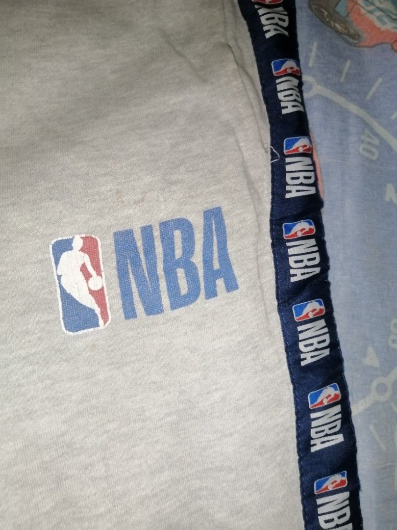 NBA Sweatpants - Medium (Category: Joggers) located in Caloocan City. Submitted by aviannarivera (Listing ID 1435551034, Image 2). Description: - Gray NBA sweatpants - Size: Medium - Features NBA logo - Navy blue stripe detail - Drawstring waist - Made in China.