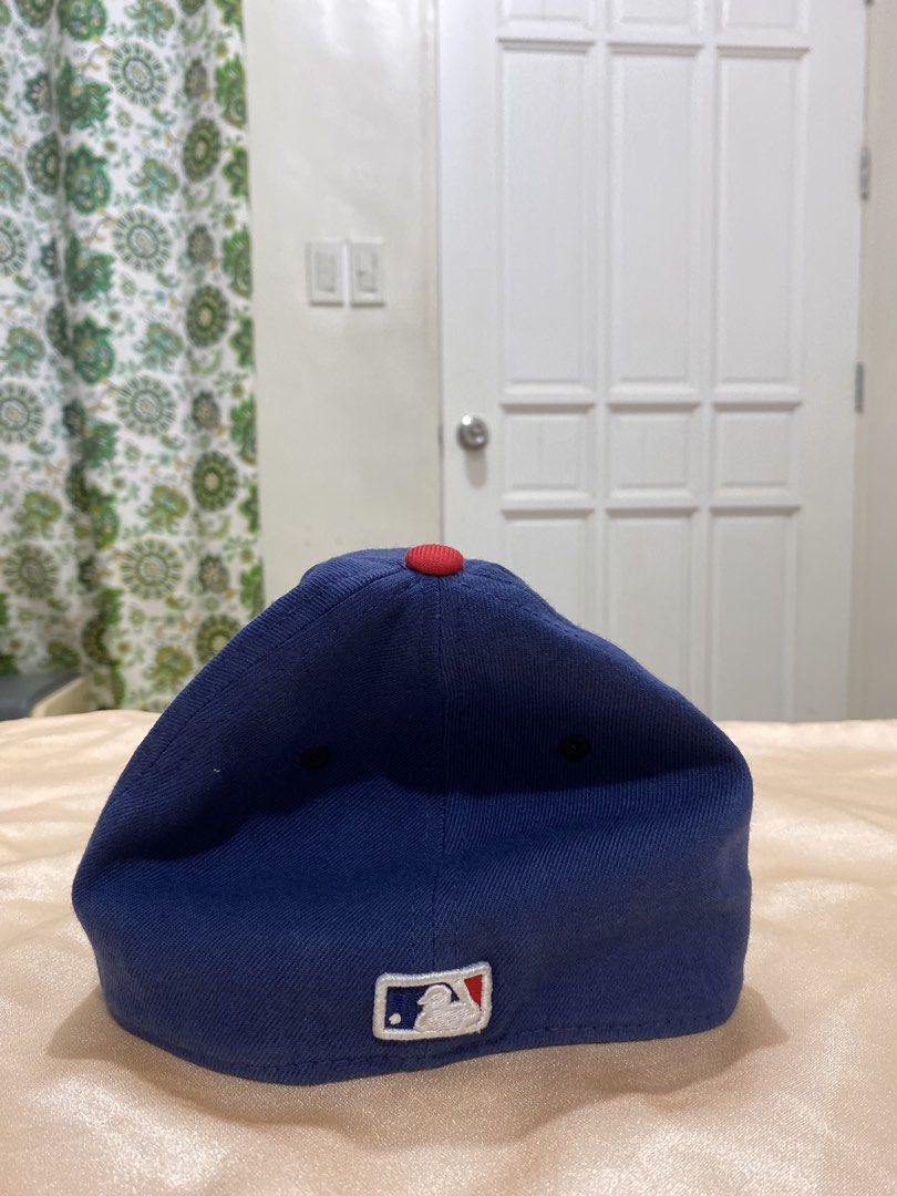 New Era Cleveland Indians Cap (Category: Caps & Hats) located in Koronadal. Submitted by jeankeeper (Listing ID 1435643525, Image 3). Description: Cleveland Indians Cap Color: Red brim and navy blue crown Color rate: 10/10 Size: S-M on tags but real fit L-XL - Material: Wool, acrylic, and spandex Complete tags and Legit💯 Dm fore more info📥 .